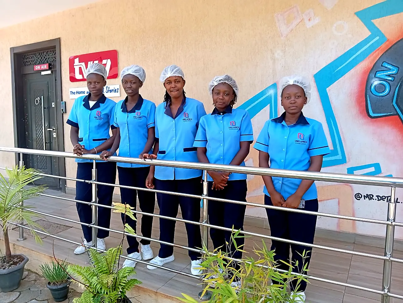 UNIQ AFRICA cleaning team in uniform on site at a media house in Nairobi